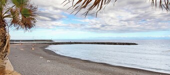 Vacation Apartment 'Beach Front Puertito' with Shared Pool, Private Terrace and Wi-Fi