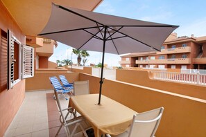 Outdoor dining - Vacation Apartment 'Beach Front Puertito' with Shared Pool, Private Terrace and Wi-Fi (Güimar)