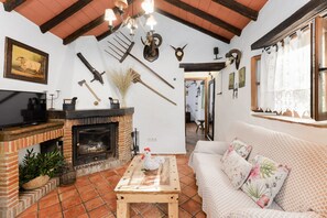 TV, fireplace - Vacation Home "Cortijo Rural Las Aves" with Shared Pool & Shared Garden (jimena de la frontera)