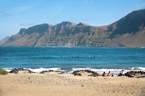 Ferienhaus 'Casa Famara' mit Meerblick, privater Terrasse und WLAN