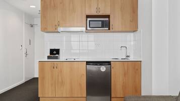 Microwave, stovetop, toaster, cookware/dishes/utensils