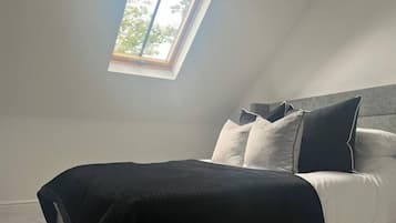 2 dormitorios, tabla de planchar con plancha, wifi y ropa de cama