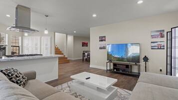 TV, fireplace, books, offices