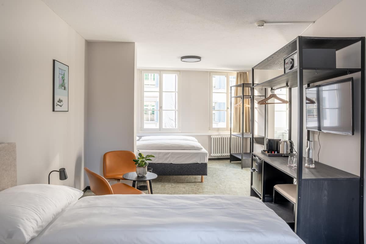 Superior Quadruple Room | Down comforters, in-room safe, desk, iron/ironing board
