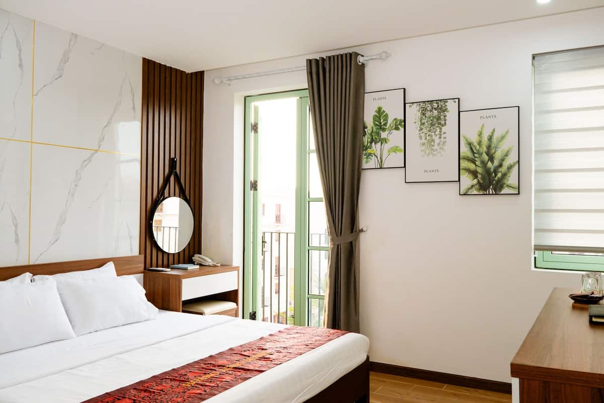 Doppia Deluxe, 1 letto king | Con arredamento individuale, una scrivania, Wi-Fi gratuito