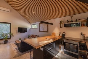 Fridge, microwave, oven, stovetop - White Bear Cottage-Chesterman, OD shower, Surf, BBQ (Tofino)