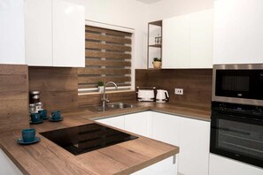 Fridge, microwave, oven, stovetop - East Garden Residences, modern, central condo with 2 large balconies. (MSIDA (MALTA))