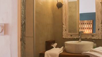Shower, hair dryer, towels, toilet paper