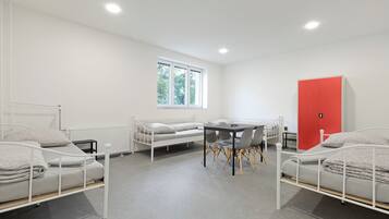 Comfort Quadruple Room | Pillowtop beds, desk, soundproofing, free WiFi