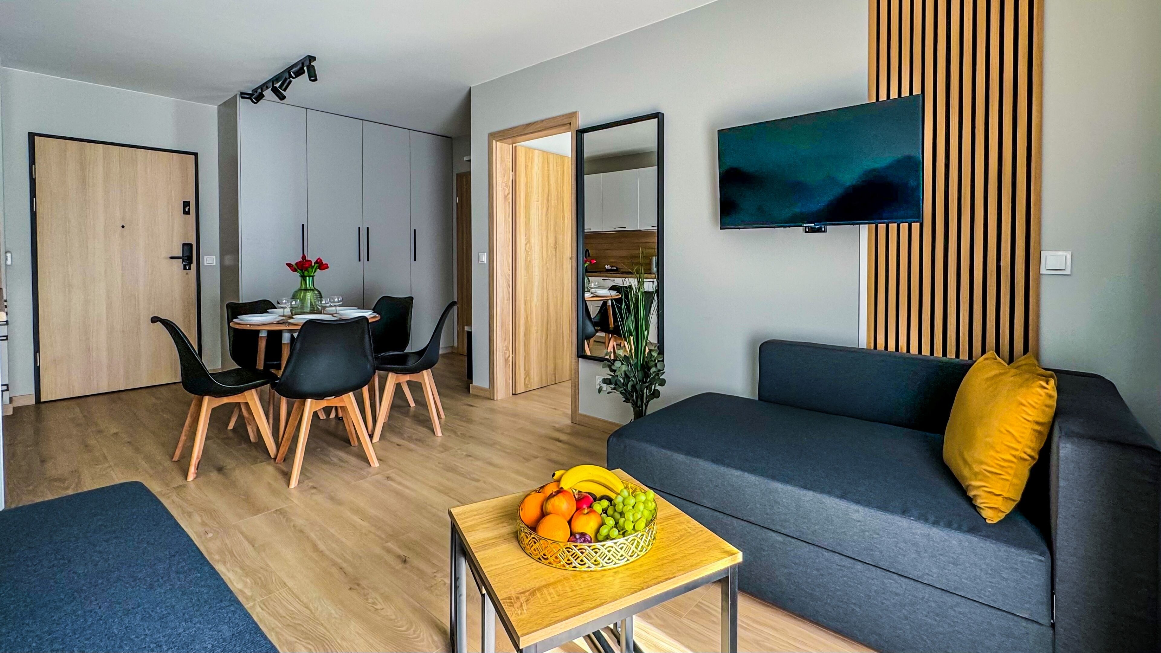 Apartment (9 E) | Living area | Flat-screen TV
