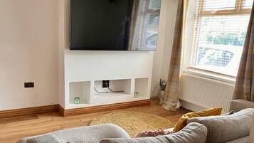 House | Living area | TV, fireplace