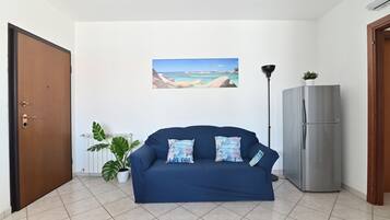 Standard Apartment | Living room | 49-inch Smart TV with cable channels