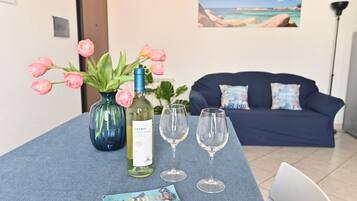 Standard Apartment | Living room | 49-inch Smart TV with cable channels