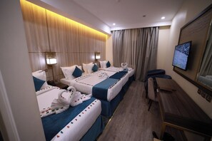 Quadruple Room | In-room safe, blackout drapes, soundproofing, iron/ironing board - Al Ebaa Hotel (Makkah)