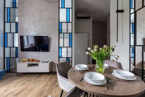 Deluxe Apartment, 1 Queen Bed with Sofa bed, Non Smoking | Living area | 50-inch Smart TV with cable channels, Netflix, streaming services - Canvas House by Fragola Collection (Kraków)