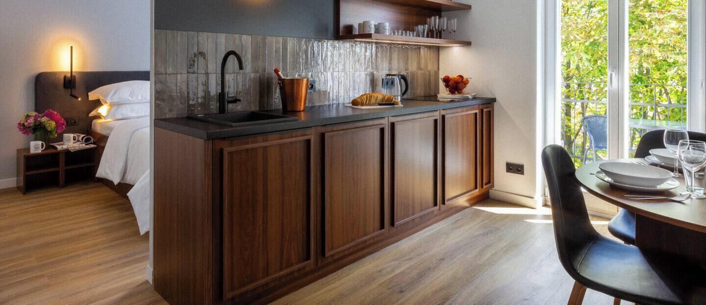 Design Apartment, Non Smoking, Balcony | Living area | 50-inch Smart TV with cable channels, Netflix, streaming services