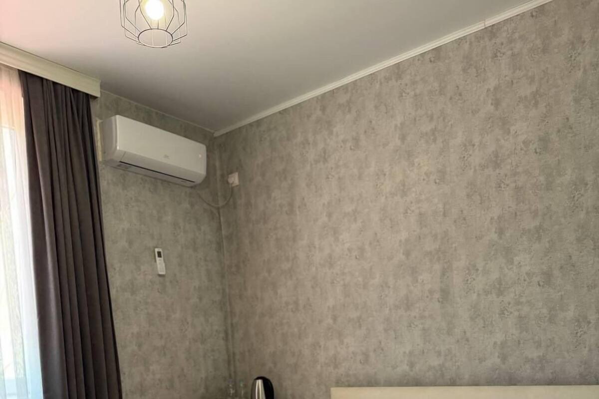 Basic Room | Bathroom | Combined shower/tub, deep soaking tub, hair dryer, slippers