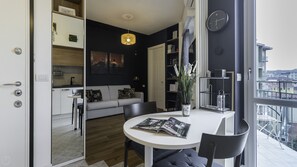 Apartment (1 Bedroom) | Living area | 55-inch TV with cable channels