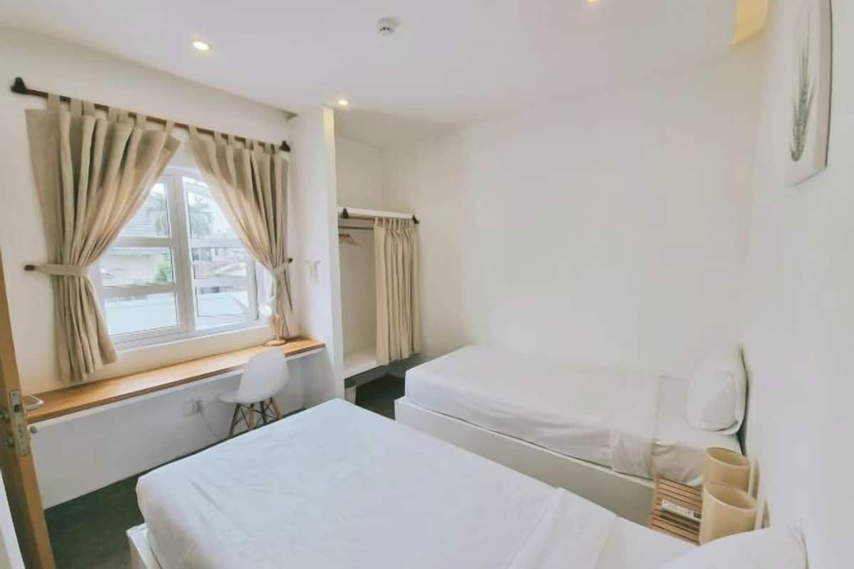 2 bedrooms, desk, blackout curtains, iron/ironing board
