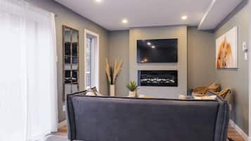 Condo Oasis 52 | Living area | 45-inch TV with cable channels, DVD player, pay films