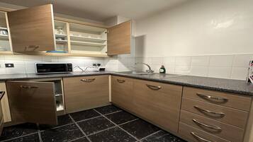 Apartment | Private kitchen | Fridge, microwave, oven, stovetop