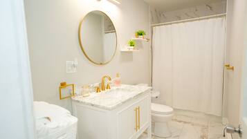 Hair dryer, towels, soap, toilet paper