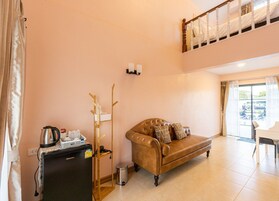 Deluxe Villa, 1 King Bed with Sofa bed | Living area | 40-inch Smart TV with digital channels