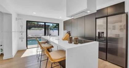 Modern 4BR Pool Home Minutes from Beach & Stadium