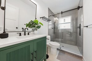 Shower, hair dryer, towels, soap