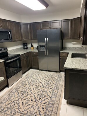 Fridge, microwave, oven, stovetop - BEAUTIFUL WATERFRONT HOME WITH SALTWATER POOL AND CANAL ACCESS (Saint James City)