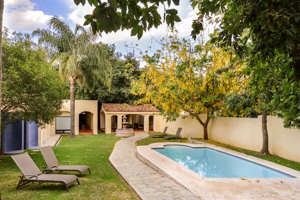 Outdoor pool, open 10:00 AM to 8:30 PM, free pool cabanas, pool loungers