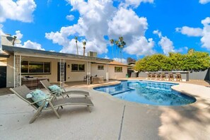Outdoor pool, a heated pool - Luxury Pool House mins to ASU with BBQ + Bar, 4 bedrooms, 3 bathrooms Sleeps 10  (Tempe)