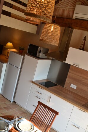 Fridge, microwave, stovetop, coffee/tea maker