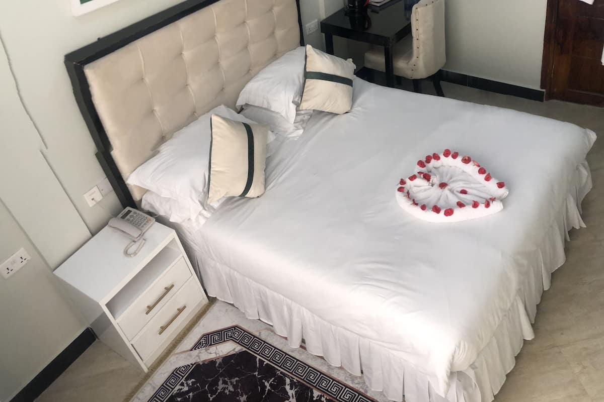 Deluxe Room, 1 Bedroom, Beach View, Ground Floor | 1 bedroom, in-room safe, WiFi (free)