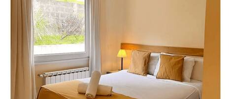 1 غرفة نوم وواي فاي وملاءات أسرّة