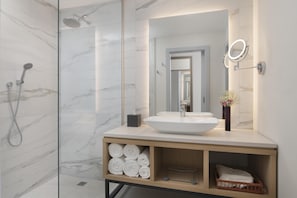 Shower, hair dryer, slippers, towels