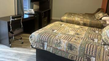 Habitación doble Elite | Escritorio, espacio para trabajar con laptop y cortinas blackout