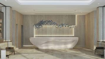 Welcome to our reception area, featuring a sleek reception desk and a unique display above, surrounded by comfortable seating areas.