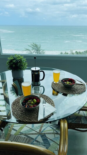 Enjoy a romantic meal for two on the balcony with a stunning ocean view.