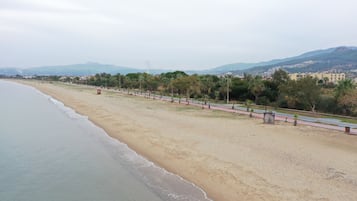 Sun-loungers, beach umbrellas, beach towels