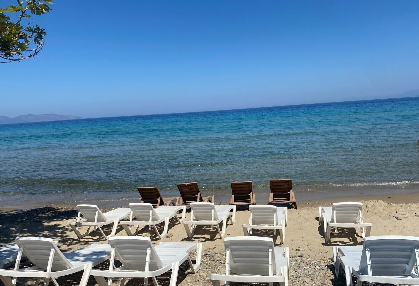 Sun-loungers, beach umbrellas, beach towels