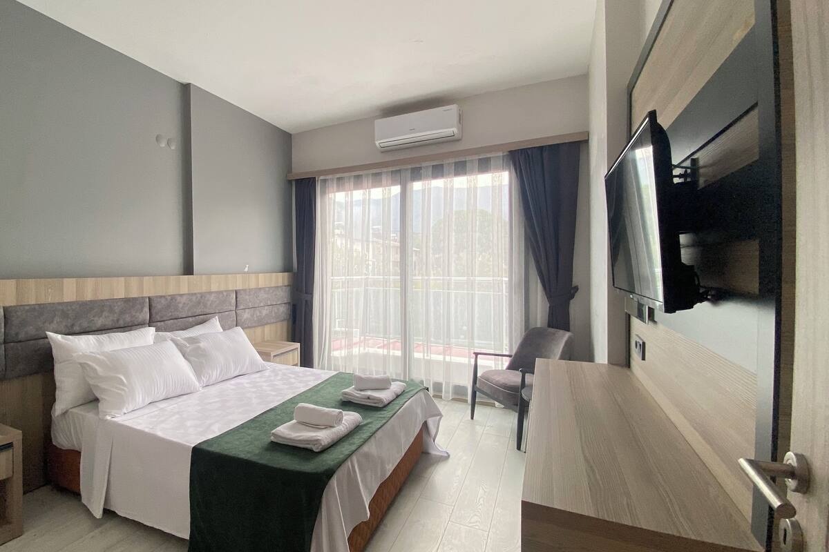 Familieværelse - 2 soveværelser | 2 soveværelser, minibar, skrivebord, gratis Wi-Fi