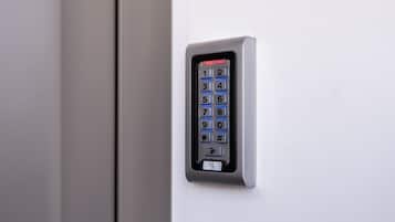A keypad lock on a door.