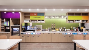 A breakfast bar with a variety of food items and a sign that reads "GOOD MORNING". - Home2 Suites By Hilton Jackson (Jackson)