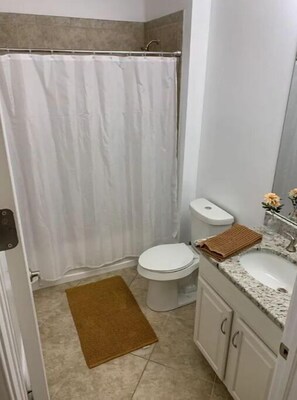 Hair dryer, towels, soap, shampoo