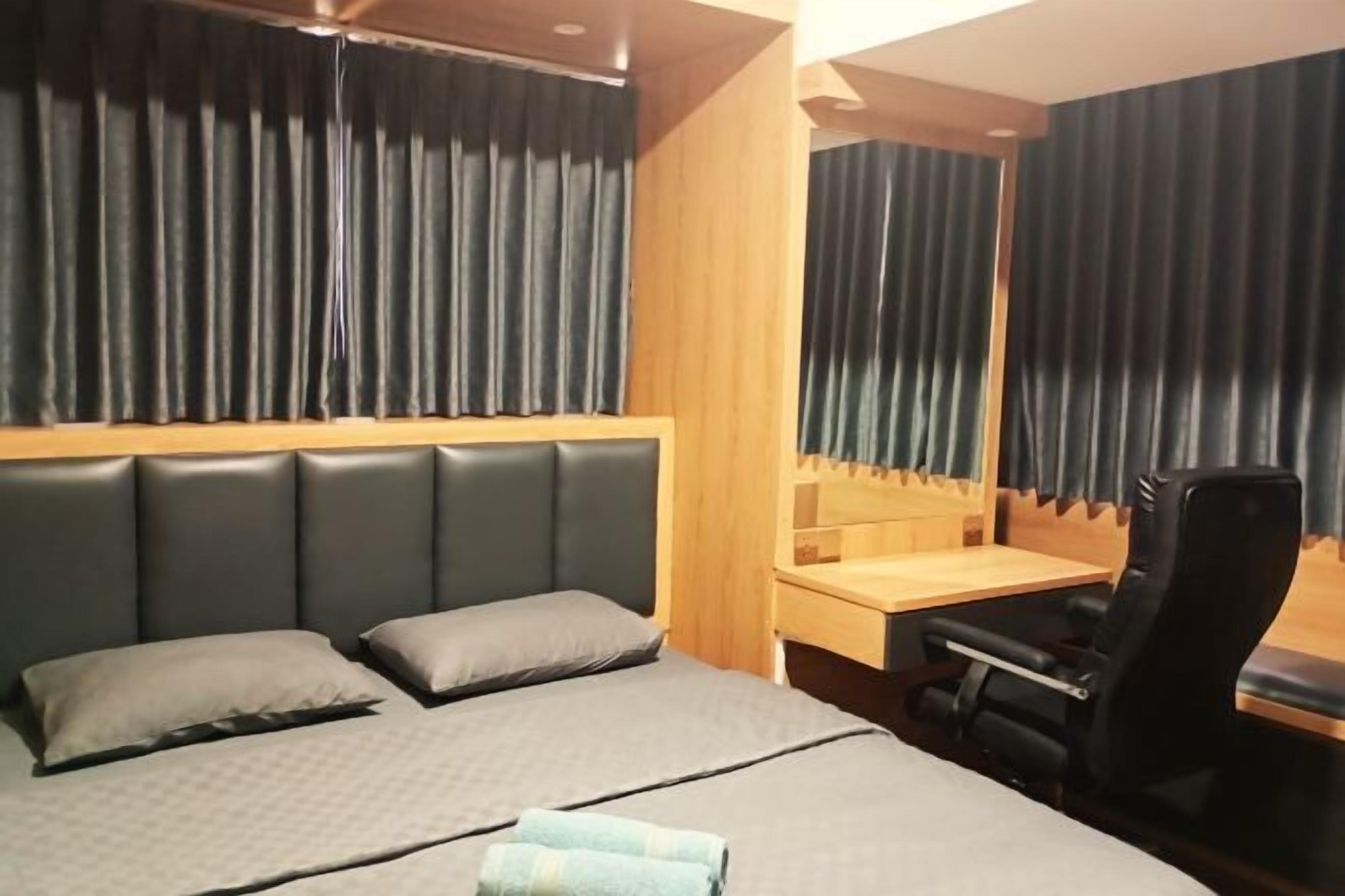 Desk, laptop workspace, free WiFi, bed sheets