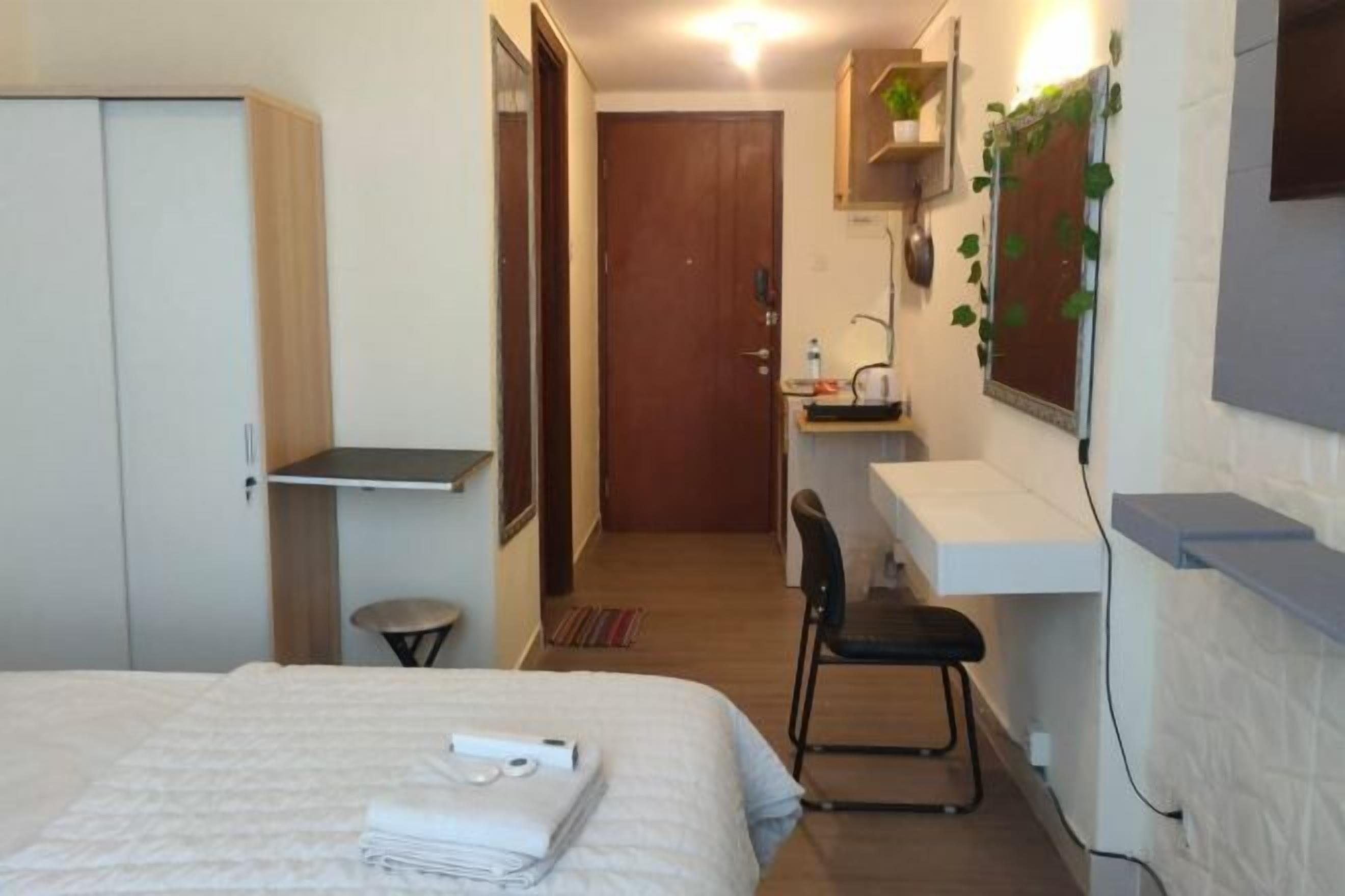 Desk, laptop workspace, free WiFi, bed sheets