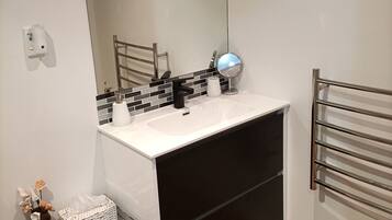 Hair dryer, towels, soap, shampoo