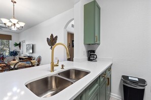 Condo, Multiple Beds, Balcony (CW7654-104) | Private kitchen | Fridge, microwave, oven, stovetop - 7654 Comrow Street Unit 104 (Kissimmee)