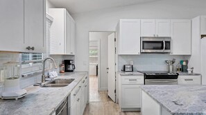 House, Multiple Beds, Patio, Ocean View (NVS2400) | Private kitchen